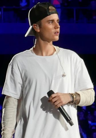 Justin Bieber performing on stage in 2015